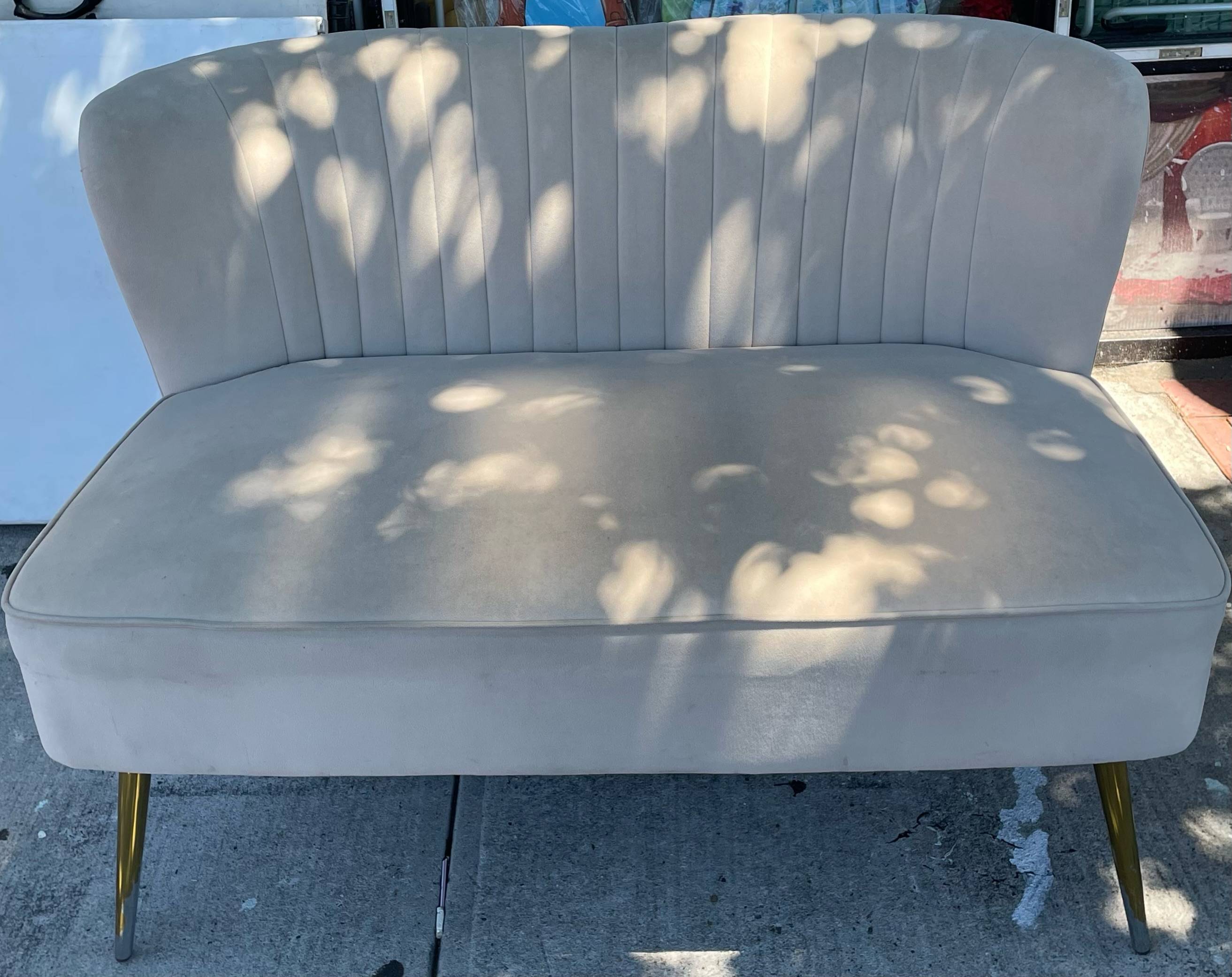 Tan Upholstered Love Seat